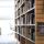 Brightly lit bookshelves.